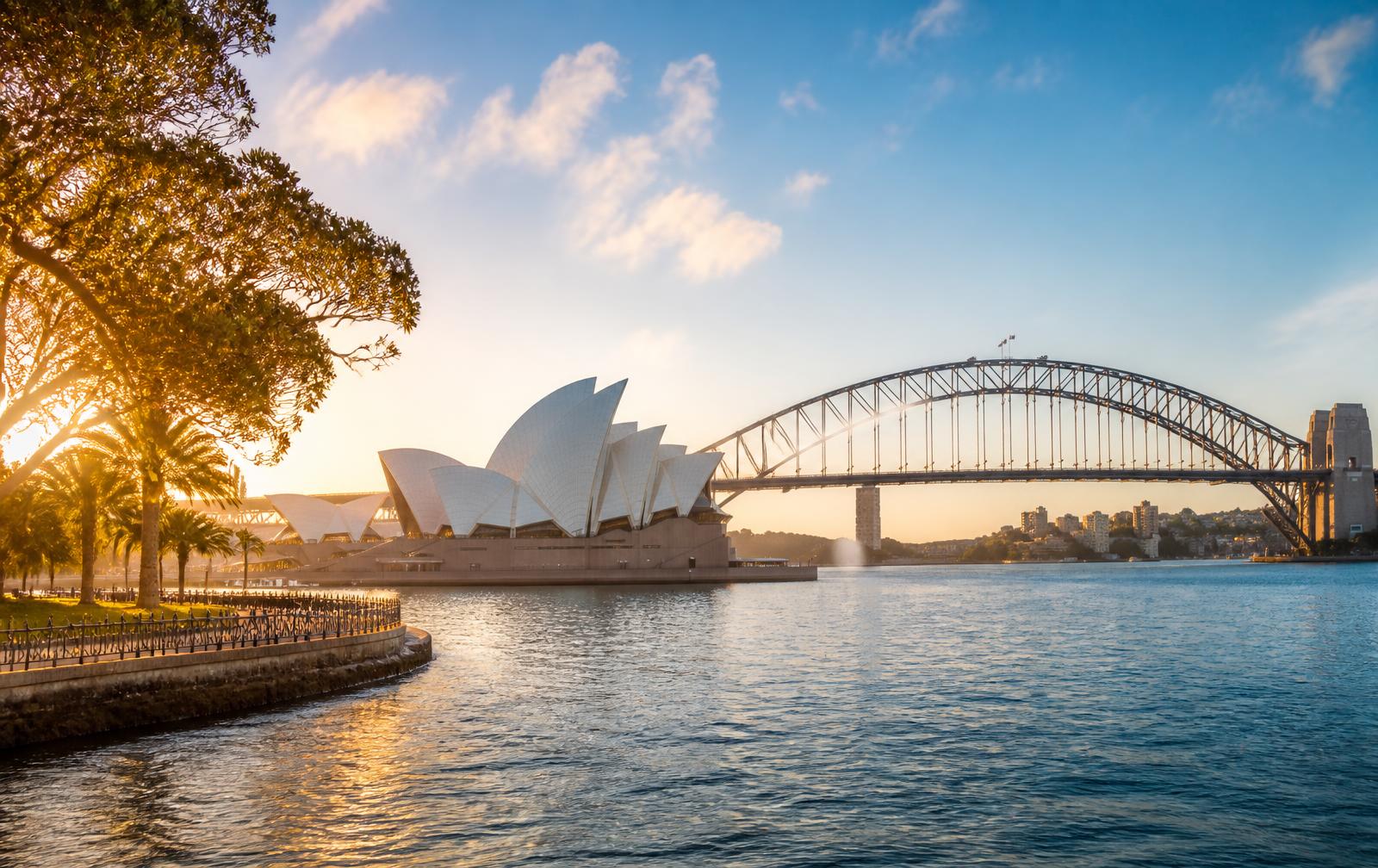 Sydney Opera House and Harbour Bridge in warm late-afternoon light